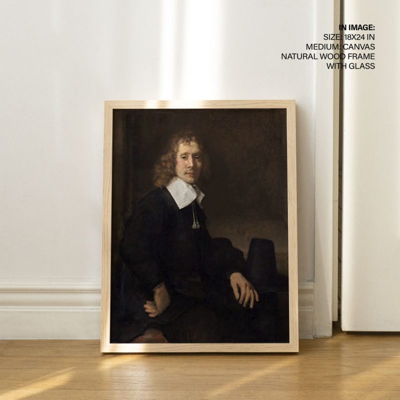 A young man at a table govaert flinck) by Rembrandt (1660)