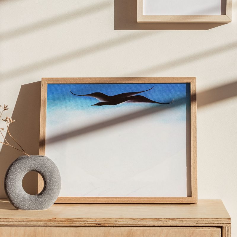 A black bird with snow covered red hills by Georgia O'Keeffe (1946)