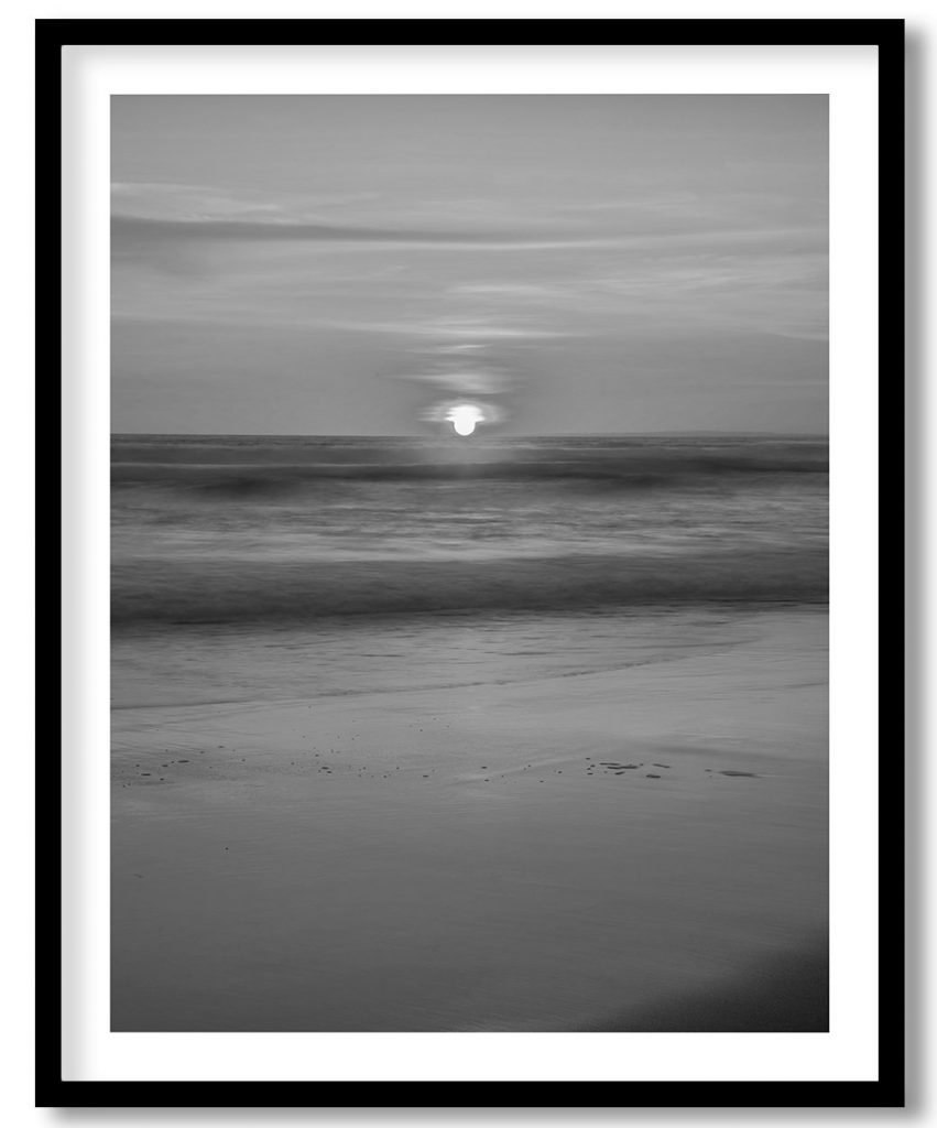 Sun Setting Behind Waves