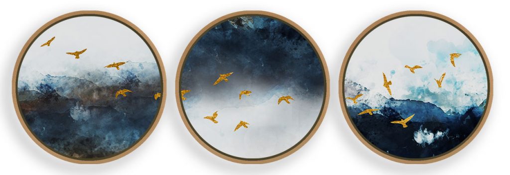Set of 3 golden mercurial birds in the sky