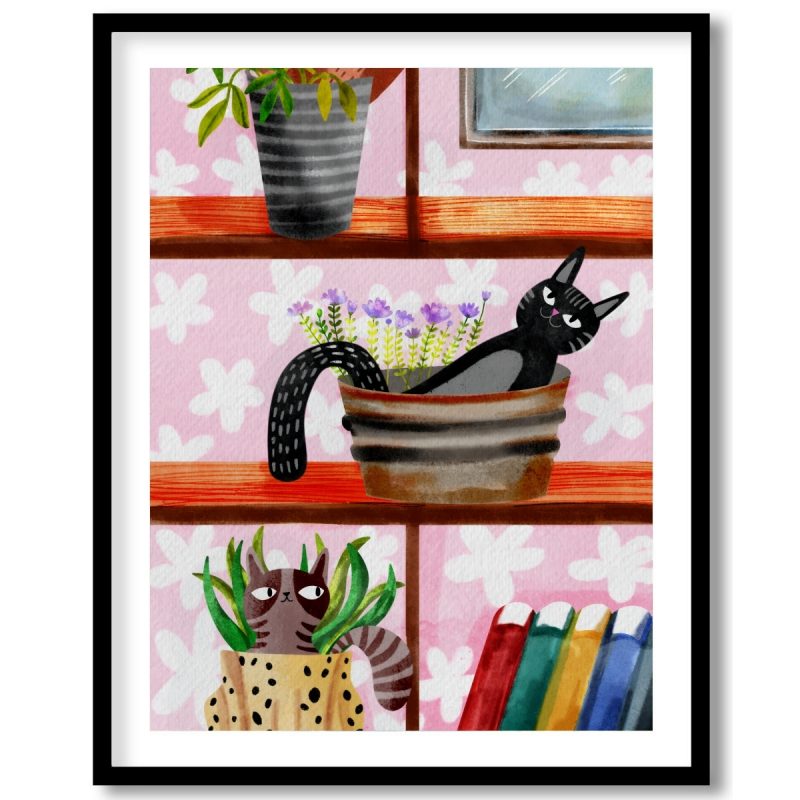 All my cats - on a bookshelf